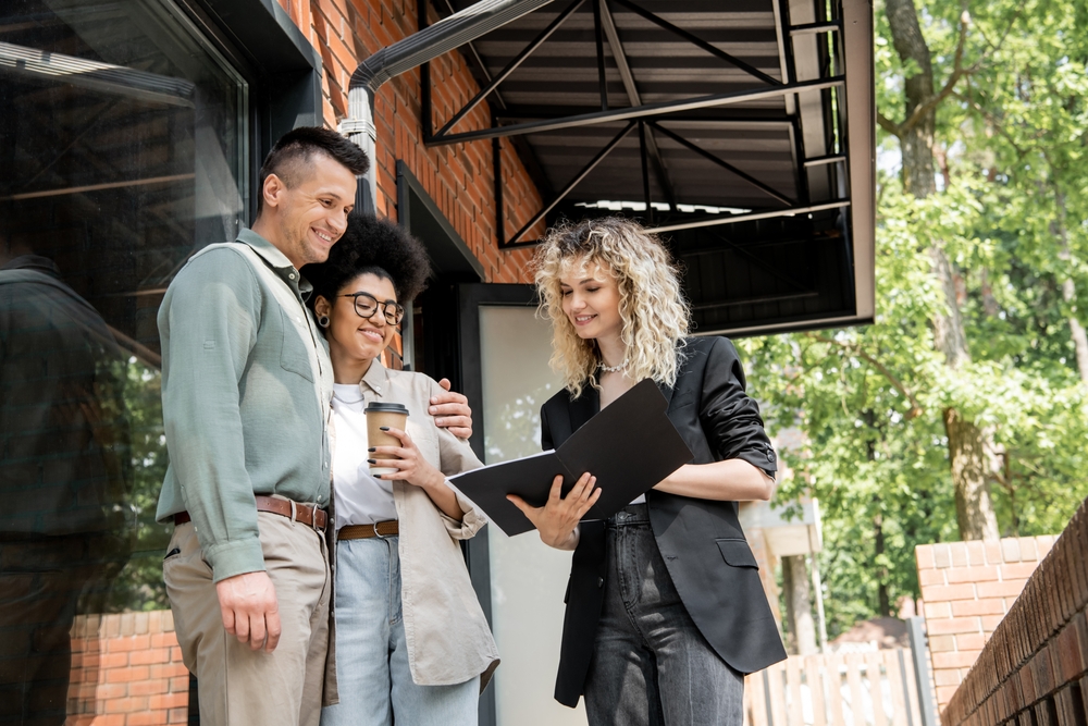 real estate agent with clients